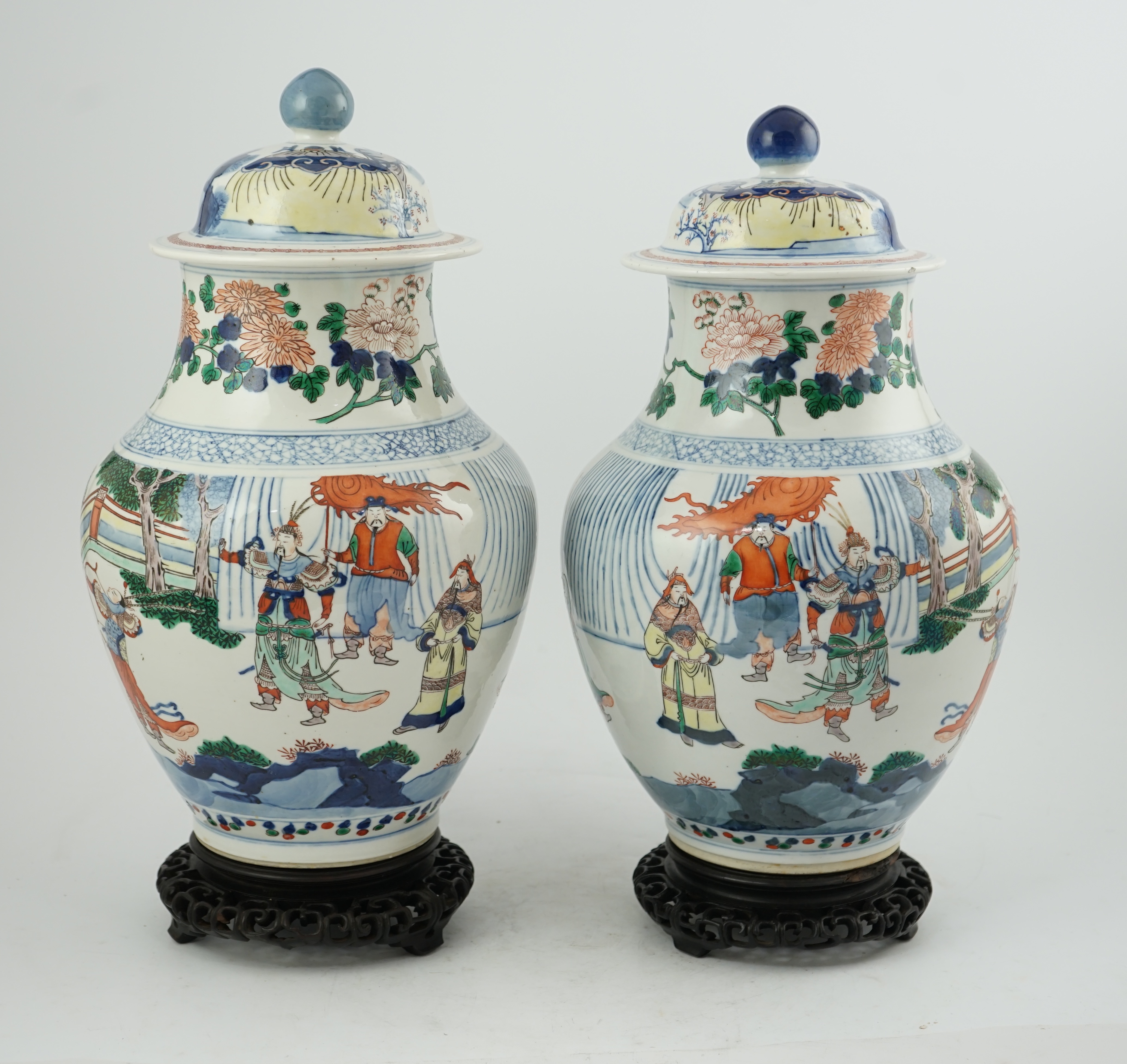 A pair of large Chinese wucai jars and covers, late 19th century